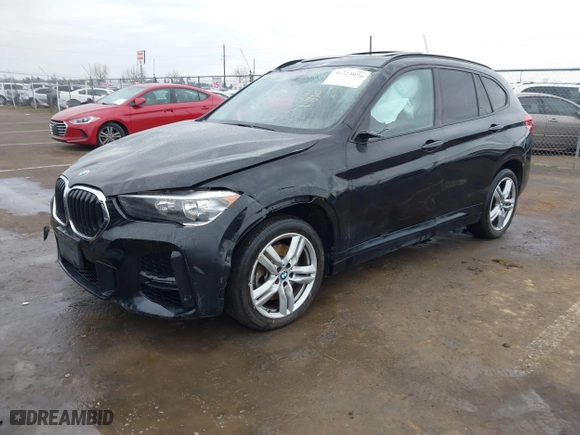 2021 BMW X1 xDrive28i with VIN WBXJG9C01M3M71033, listed as a IAAI auction lot 41723970 with 71,000 mi miles. Bid and sale history available at carsss.com. Image 17.