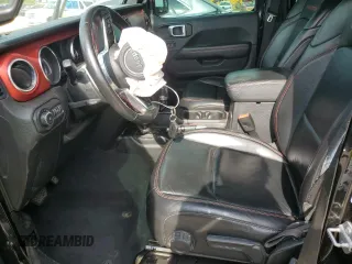 2019 Jeep Wrangler Unlimited Rubicon with VIN 1C4HJXFN2KW525606, listed as a Copart auction lot 62674225 with 55,128 mi miles and Salvage title. Bid and sale history available at DreamBid. Image 7.