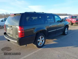 2010 Chevrolet Suburban LTZ with VIN 1GNUKKE3XAR142743, listed as a IAAI auction lot 41413380 with 236,384 mi miles. Bid and sale history available at carsss.com. Image 4.