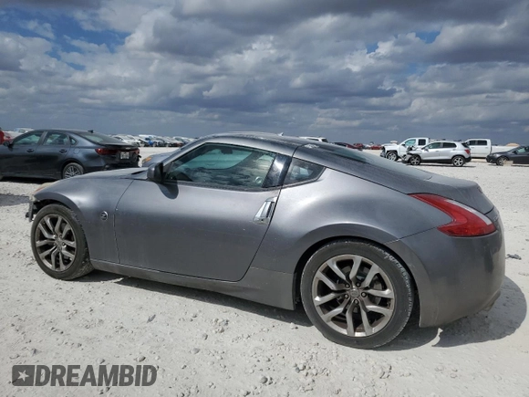 2013 Nissan 370Z with VIN JN1AZ4EH7DM880230, listed as a Copart auction lot 78398894 with 130,871 mi miles and Salvage Title. Bid and sale history available at carsss.com. Image 2.