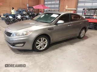 2013 Kia Optima EX with VIN 5XXGN4A74DG165525, listed as a IAAI auction lot 42405482 with 132,820 mi miles and . Bid and sale history available at DreamBid. Image 2.
