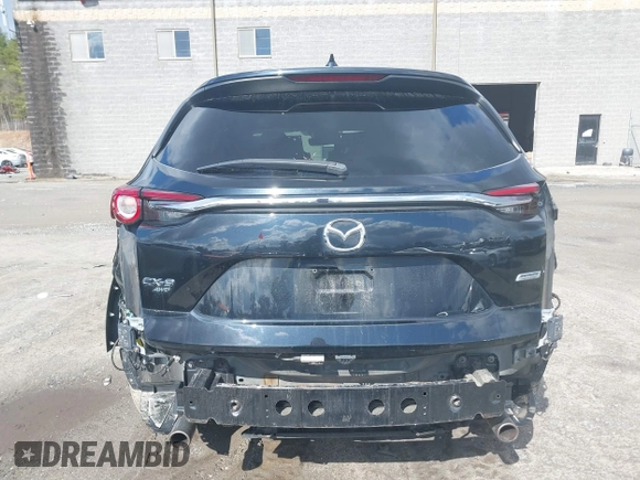 2019 Mazda CX-9 Touring z VIN JM3TCBCY0K0317028, wystawiony jako IAAI lot #41814713 z przebiegiem 155 280 mil mil oraz . Historia ofert i sprzedaży dostępna na DreamBid. Obrazek 17.