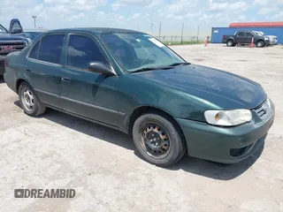 2001 Toyota Corolla CE with VIN 2T1BR12E51C484476, listed as a IAAI auction lot 42694919 with 194,208 mi miles and . Bid and sale history available at DreamBid. Image 1.