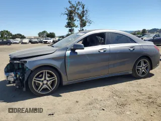 2014 Mercedes-Benz CLA 250 with VIN WDDSJ4EB5EN159989, listed as a Copart auction lot 64262795 with 67,515 mi miles and Salvage title. Bid and sale history available at DreamBid. Image 1.