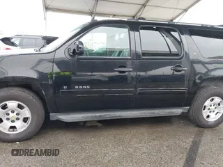 2011 Chevrolet Suburban LT with VIN 1GNSCJE01BR327933, listed as a IAAI auction lot 41813011 with 279,627 mi miles. Bid and sale history available at carsss.com. Image 14.