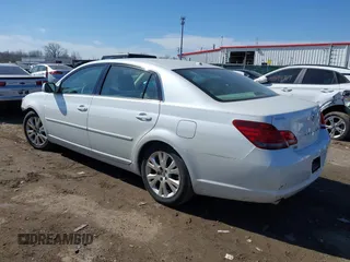 2010 Toyota Avalon XL with VIN 4T1BK3DB1AU359007, listed as a IAAI auction lot 41683221 with 70,020 mi miles and . Bid and sale history available at carsss.com. Image 3.