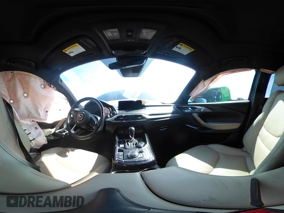 2021 Mazda CX-9 Carbon Edition with VIN JM3TCBDY3M0524241, listed as a IAAI auction lot 42538127 with 50,533 mi miles and . Bid and sale history available at DreamBid. Image 18.