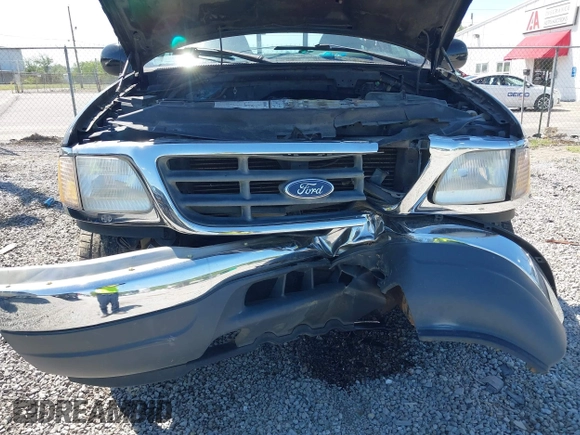 2000 Ford F-150 XL with VIN 1FTZF1828YNC09020, listed as a IAAI auction lot 42034099 with 167,692 mi miles and . Bid and sale history available at DreamBid. Image 6.