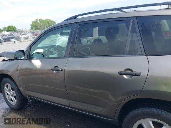 2009 Toyota RAV4 with VIN JTMZF33V69D015171, listed as a IAAI auction lot 42006163 with 122,927 mi miles. Bid and sale history available at carsss.com. Image 14.