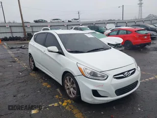 2014 Hyundai Accent SE with VIN KMHCU5AE8EU145629, listed as a IAAI auction lot 41497848 with 134,919 mi miles. Bid and sale history available at carsss.com. Image 1.