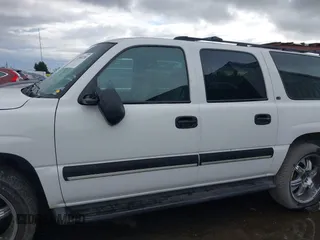 2001 Chevrolet Suburban LS with VIN 3GNEC16T21G209183, listed as a IAAI auction lot 41503236 with 216,462 mi miles. Bid and sale history available at carsss.com. Image 14.
