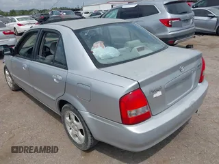 2002 Mazda Protege DX z VIN JM1BJ225921576001, wystawiony jako IAAI lot #40165055 z przebiegiem Nie podano mil oraz . Historia ofert i sprzedaży dostępna na DreamBid. Obrazek 3.