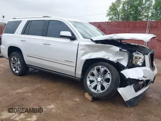 2016 GMC Yukon Denali with VIN 1GKS1CKJ7GR237852, listed as a IAAI auction lot 41944398 with 65,703 mi miles. Bid and sale history available at carsss.com. Image 1.