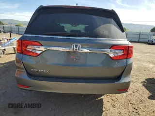 2018 Honda Odyssey EX-L with VIN 5FNRL6H76JB010103, listed as a Copart auction lot 52965965 with 129,837 mi miles and Salvage Title. Bid and sale history available at carsss.com. Image 6.