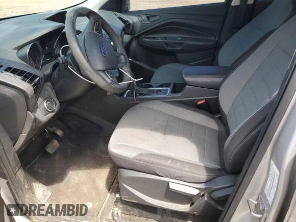 2018 Ford Escape S with VIN 1FMCU0F78JUB79464, listed as a Copart auction lot 58812925 with 104,642 mi miles and Salvage title. Bid and sale history available at DreamBid. Image 7.