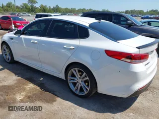 2016 Kia Optima LX with VIN KNAGT4L32G5085128, listed as a IAAI auction lot 42016728 with 259,218 mi miles. Bid and sale history available at carsss.com. Image 3.