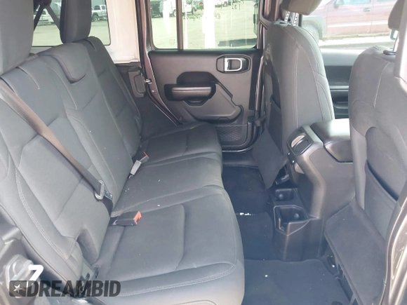 2019 Jeep Wrangler Unlimited Sport S with VIN 1C4HJXDG0KW541940, listed as a IAAI auction lot 42100255 with 68,309 mi miles and . Bid and sale history available at DreamBid. Image 8.