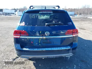 2018 Volkswagen Atlas SE with VIN 1V2DP2CA6JC592774, listed as a IAAI auction lot 41389952 with 58,546 mi miles and . Bid and sale history available at DreamBid. Image 16.
