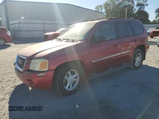 2002 GMC Envoy SLE with VIN 1GKDS13S822130022, listed as a Copart auction lot 76937364 with 229,038 mi miles and Salvage Title. Bid and sale history available at carsss.com. Image 1.