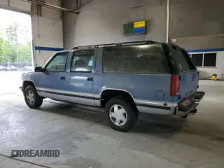 1994 GMC Suburban z VIN 1GKFK16K3RJ725171, wystawiony jako Copart lot #57914635 z przebiegiem 226 183 mil mil oraz Tytuł czysty. Historia ofert i sprzedaży dostępna na DreamBid. Obrazek 2.