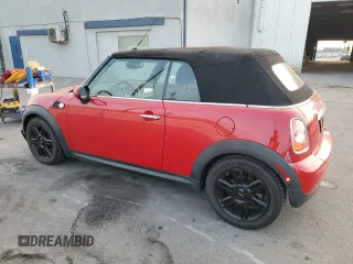 2015 MINI Convertible with VIN WMWZN3C59FT862963, listed as a Copart auction lot 86016514 with 96,493 mi miles and Salvage title. Bid and sale history available at DreamBid. Image 2.