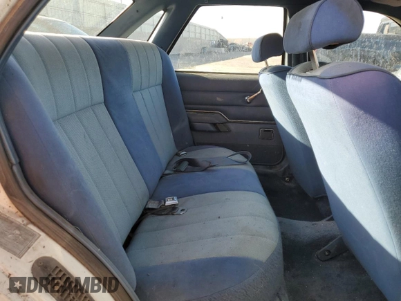 1986 Ford Tempo z VIN 1FABP22X4GK263512, wystawiony jako Copart lot #50618855 z przebiegiem 392 265 mil mil oraz Czysty tytuł • Clean title. Historia ofert i sprzedaży dostępna na DreamBid. Obrazek 10.