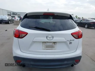 2013 Mazda CX-5 Grand Touring with VIN JM3KE2DEXD0166115, listed as a IAAI auction lot 41919164 with 102,999 mi miles and . Bid and sale history available at carsss.com. Image 17.