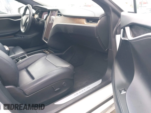 2018 Tesla Model S 75D with VIN 5YJSA1E23JF271465, listed as a IAAI auction lot 41911356 with 50,483 mi miles and . Bid and sale history available at DreamBid. Image 5.
