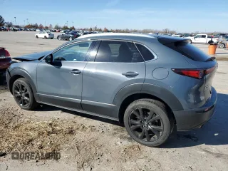 2021 Mazda CX-30 Premium with VIN 3MVDMBDY6MM300242, listed as a Copart auction lot 82195024 with 34,500 mi miles and Salvage Title. Bid and sale history available at carsss.com. Image 2.