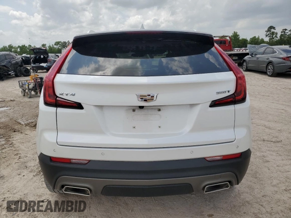 2021 Cadillac XT4 FWD Premium Luxury with VIN 1GYFZCR44MF080763, listed as a Copart auction lot 54059525 with 46,319 mi miles and Salvage Title. Bid and sale history available at carsss.com. Image 6.