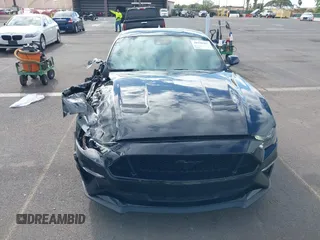 2021 Ford Mustang GT z VIN 1FA6P8CF1M5147740, wystawiony jako IAAI lot #38920487 z przebiegiem 15 299 mil mil oraz . Historia ofert i sprzedaży dostępna na DreamBid. Obrazek 21.