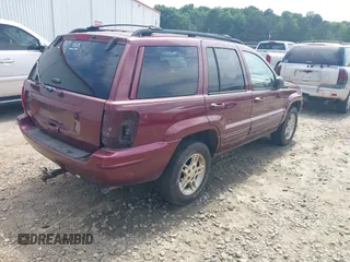 1999 Jeep Grand Cherokee Limited with VIN 1J4G268S5XC529951, listed as a IAAI auction lot 42317713 with 188,001 mi miles and . Bid and sale history available at DreamBid. Image 4.