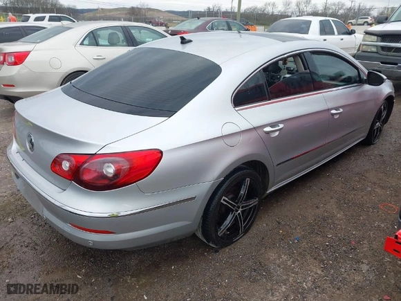 2009 Volkswagen CC VR6 Sport with VIN WVWEU73C99E557501, listed as a IAAI auction lot 41842303 with 203,114 mi miles. Bid and sale history available at carsss.com. Image 4.