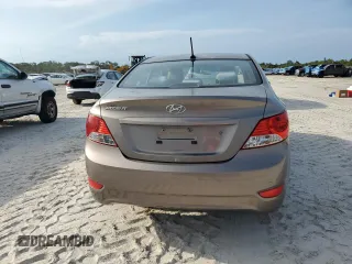 2014 Hyundai Accent GLS z VIN KMHCT4AEXEU680071, wystawiony jako Copart lot #50253905 z przebiegiem 84 454 mil mil oraz Szkoda całkowita • Salvage title. Historia ofert i sprzedaży dostępna na DreamBid. Obrazek 6.