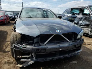 2019 BMW 3 Series 330i with VIN WBA5R1C55KAJ98853, listed as a Copart auction lot 50699315 with 101,110 mi miles and Salvage title. Bid and sale history available at DreamBid. Image 5.