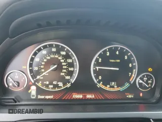 2012 BMW 7 Series 740i with VIN WBAKA4C56CDS99041, listed as a Copart auction lot 41436735 with 170,059 mi miles and Clean title. Bid and sale history available at DreamBid. Image 9.