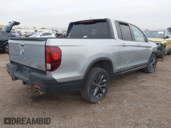 2023 Honda Ridgeline Sport z VIN 5FPYK3F16PB049866, wystawiony jako IAAI lot #41068916 z przebiegiem Nie podano mil oraz . Historia ofert i sprzedaży dostępna na DreamBid. Obrazek 4.