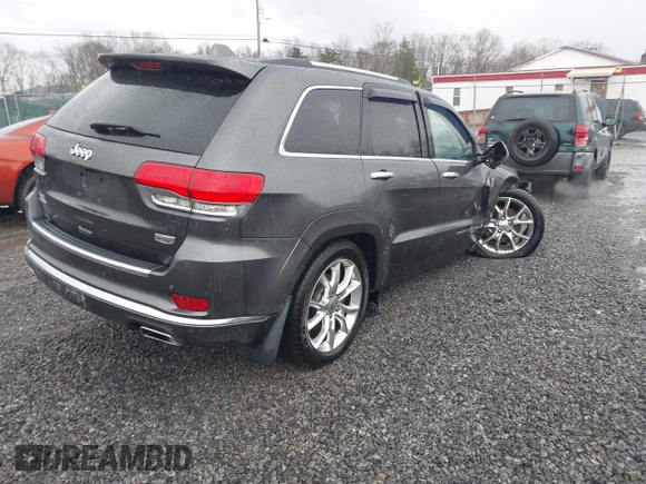 2015 Jeep Grand Cherokee Summit with VIN 1C4RJFJM6FC955904, listed as a IAAI auction lot 41483446 with 65,970 mi miles. Bid and sale history available at carsss.com. Image 4.