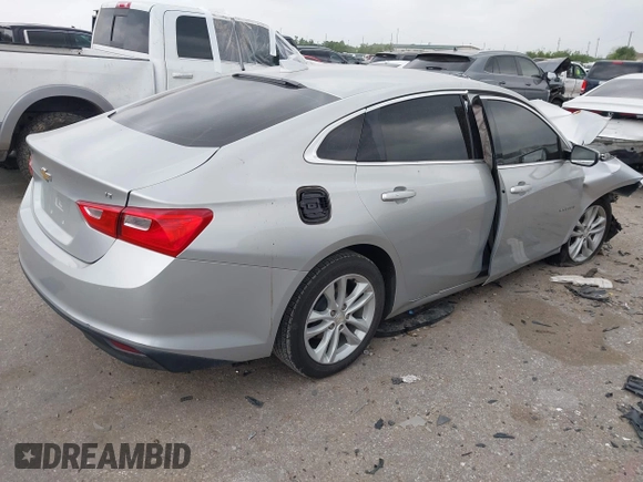 2018 Chevrolet Malibu LT z VIN 1G1ZD5ST6JF261270, wystawiony jako IAAI lot #41932928 z przebiegiem 127 971 mil mil oraz . Historia ofert i sprzedaży dostępna na DreamBid. Obrazek 4.