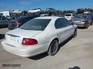 2003 Mercury Sable GS with VIN 1MEFM50U33A629599, listed as a IAAI auction lot 41579245 with 128,198 mi miles. Bid and sale history available at carsss.com. Image 4.