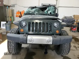 2012 Jeep Wrangler Unlimited Rubicon with VIN 1C4HJWFG4CL119390, listed as a Copart auction lot 60026425 with 305,189 mi miles and Salvage title. Bid and sale history available at DreamBid. Image 5.