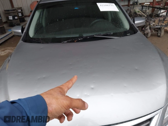 2014 Nissan Sentra S with VIN 3N1AB7AP7EL648919, listed as a IAAI auction lot 42188235 with 71,240 mi miles and . Bid and sale history available at DreamBid. Image 6.