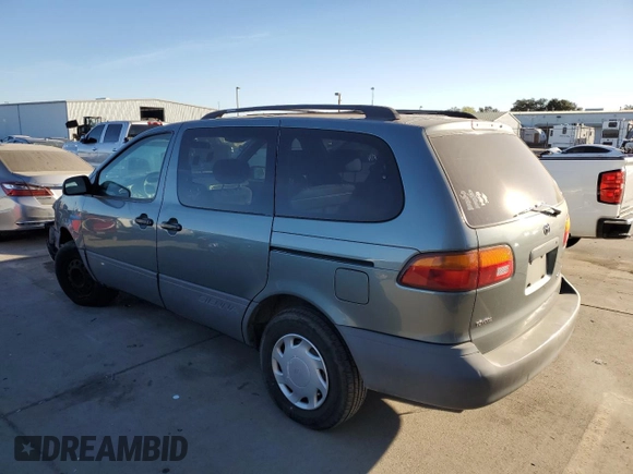 1999 Toyota Sienna CE with VIN 4T3ZF19C2XU100132, listed as a Copart auction lot 75251124 with 217,399 mi miles and Salvage Title. Bid and sale history available at carsss.com. Image 2.