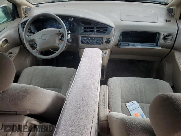 2003 Toyota Sienna LE with VIN 4T3ZF13C33U540296, listed as a Copart auction lot 62643745 with 143,727 mi miles and Salvage title. Bid and sale history available at DreamBid. Image 9.