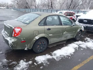 2004 Suzuki Forenza S with VIN KL5JD52Z64K027219, listed as a IAAI auction lot 41799510 with 1 mi miles. Bid and sale history available at carsss.com. Image 4.