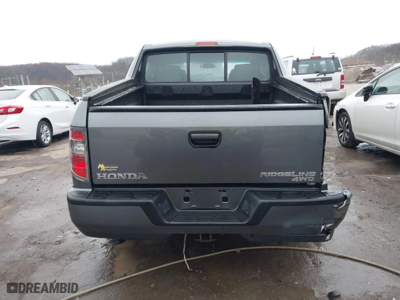 2012 Honda Ridgeline RT with VIN 5FPYK1F24CB456298, listed as a IAAI auction lot 40869948 with 123,329 mi miles. Bid and sale history available at carsss.com. Image 16.