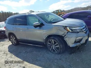 2017 Honda Pilot Touring with VIN 5FNYF6H94HB006873, listed as a IAAI auction lot 41618529 with 154,689 mi miles. Bid and sale history available at carsss.com. Image 13.