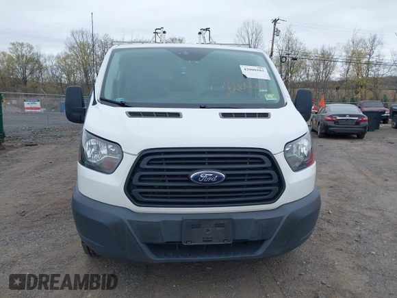 2018 Ford Transit with VIN 1FTYE1ZMXJKB56181, listed as a IAAI auction lot 42000183 with 113,112 mi miles and . Bid and sale history available at DreamBid. Image 6.
