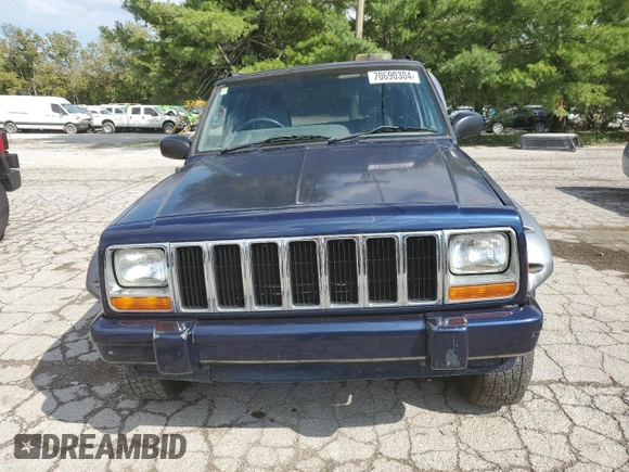 1997 Jeep Cherokee with VIN 1J4FN78S6VL604971, listed as a Copart auction lot 70690304 with 226,913 mi miles and Salvage title. Bid and sale history available at DreamBid. Image 5.