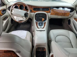 1998 Jaguar XJ Vanden Plas with VIN SAJKX6245WC830912, listed as a Copart auction lot 49717285 with 127,509 mi miles and Salvage Title. Bid and sale history available at DreamBid. Image 8.